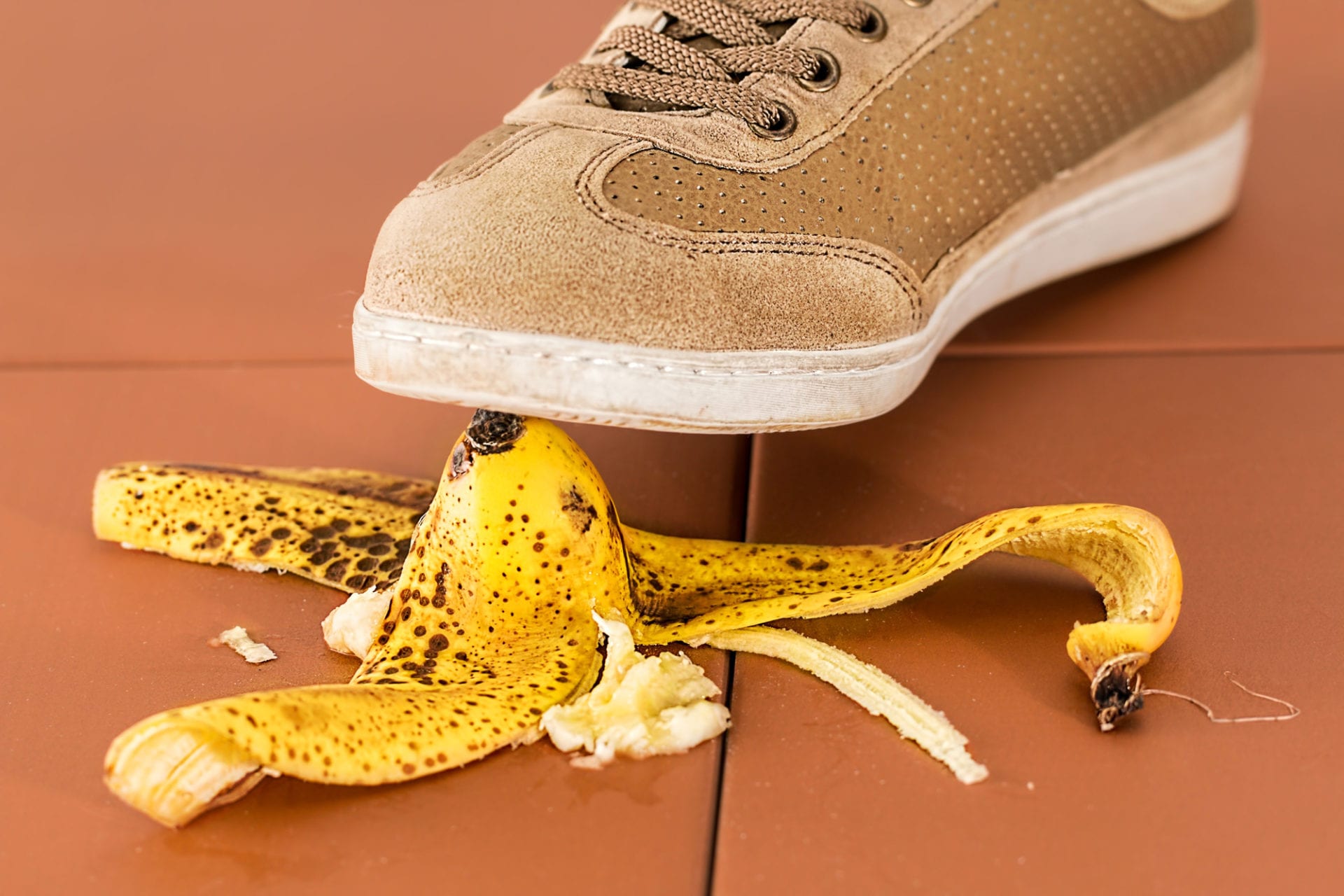 person slipping on a banana peel