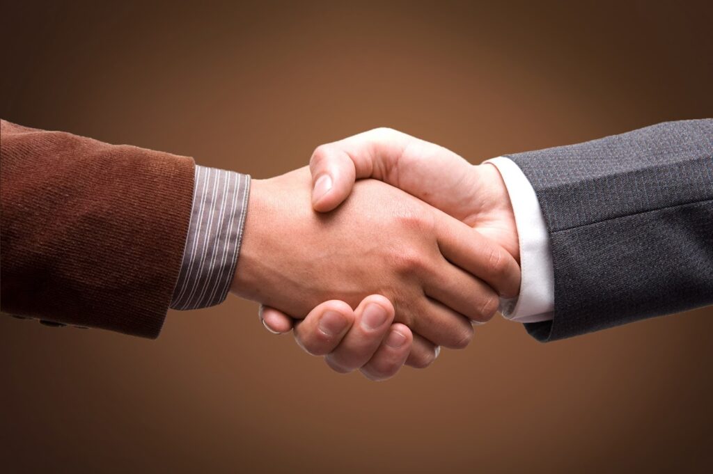 A picture of two men shaking hands